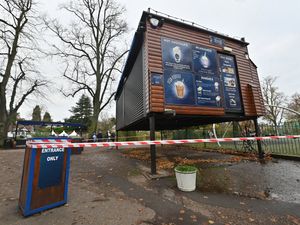 Supporting image for story: Watch: Coffee shop on stilts and flood barriers up as Shropshire prepares for river levels to peak - in pictures