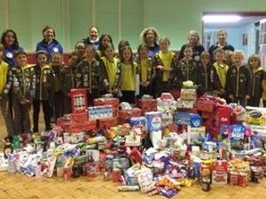Supporting image for story: Brownies link up with food bank