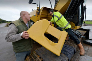 (Left) site manager Trevor Stanley and Kevin Woods at Woodfarm Golf club with the items theives tried to steal from a CAT 323D digger on the course