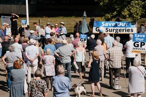 Up to 150 people gathered to demonstrate against plans that could see six GP surgeries moved to a hub
