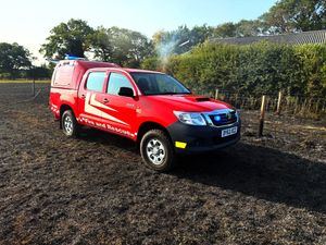 Photographs show the charred aftermath of the large field fire off the A49 in Prees, opposite the Holly Farm Garden Centre. Photo: Market Drayton Fire Station