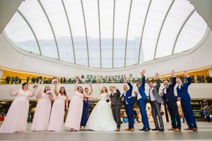 Luke and Alex Jarret with the wedding party at Grand Central – the couple are the first to be given permission for wedding photos there. Picture by Incircles Photography 