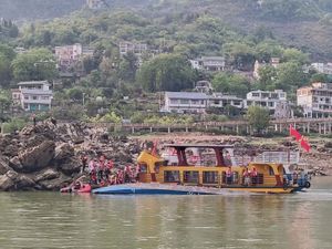 Supporting image for story: At least three people dead after Chinese tourist boats capsize during storm