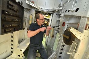 Aircraft Technician Dave Carr working on the restoration of a Handley Page Hampden
