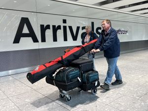 Passengers in the arrivals hall at Heathrow Terminal 5 in London