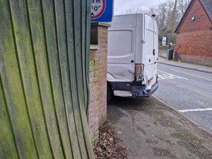 Damage was visible on the back of the van