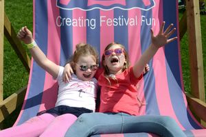 From left, Rosie Cuss aged four, and Evie Smith, five, having fun at the annual Kids Fest