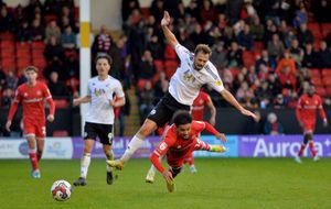Walsall's Jacob Maddox and Crawley's Jack Powell