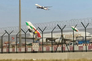 An Emirates aircraft takes off from Dubai International Airport in Dubai. (Photo by AFP via Getty Images)