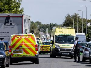 Police vehicles and ambulances in Hart Street, Southport