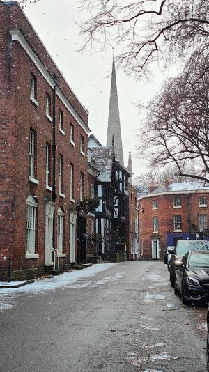 Snow falling near St Marys in Shrewsbury. Photo: Christopher Jones