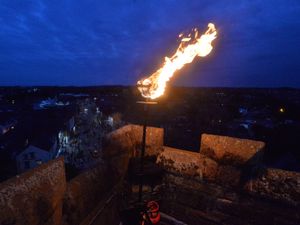 Supporting image for story: Beacons light up the night as tradition burns bright across region
