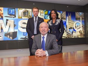 Dean Franklin and Anisa Khan with Lord Sugar in the boardroom