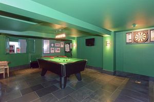 The games room with a snooker table. Pic: Rightmove/Holland Broadbridge