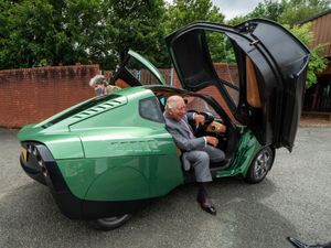 Supporting image for story: Charles test-drives hydrogen-powered eco-car