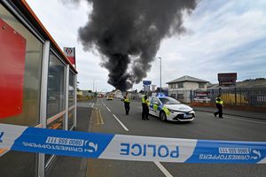 Black smoke pours into the sky from the fire at GB Tyres in West Bromwich. Photo: Tim Thursfield