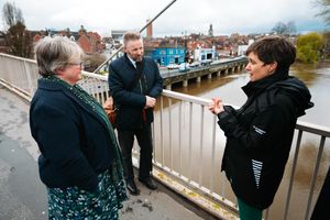 Mark Barrow, centre, discussing the River Severn with former Environment Minister Therese Coffey, and Clare Dinnis from the Environment Agency.