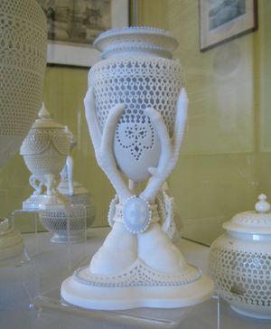 George Owen porcelain hand vase in Museums Worcestershire's display