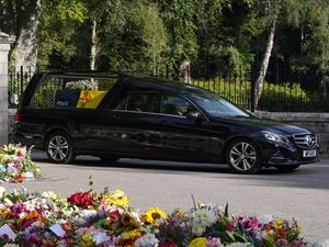 Supporting image for story: Thousands line streets as Queen’s coffin embarks on trip to final resting place