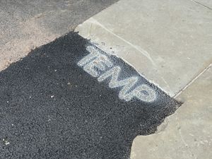 Th council has now added the word 'temp' to repairs to paving slabs in Shrewsbury