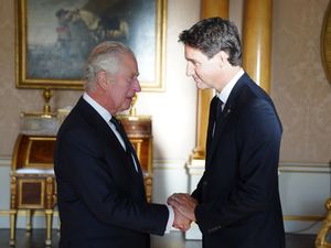 The King shakes hands with Prime Minister of Canada Justin Trudeau (Stefan Rousseau/PA)