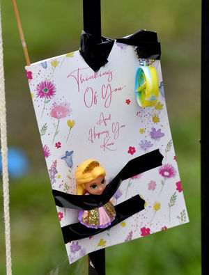 One of the many tributes left at the scene 