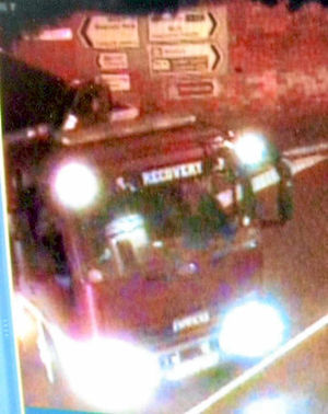 The lorry drives out of the site