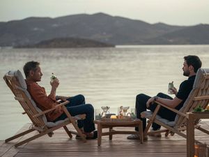 Supporting image for story: Jack Whitehall and David Duchovny enjoy cocktails in Greece in Malice first look