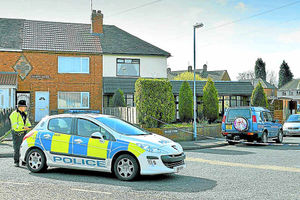Police at the scene of the fatal attack on Mr Abbas in Madison Avenue, Alumwell