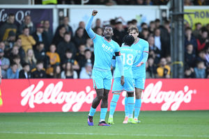 Daniel Kanu celebrates his equaliser for Walsall. 