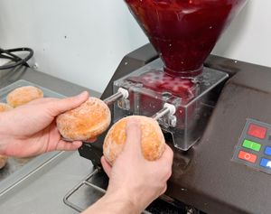 Jam donuts are filled with jam as part of the process