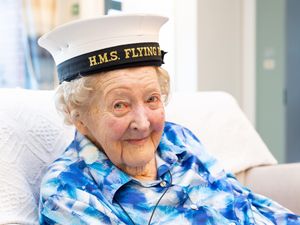 Supporting image for story: Former headmistress presented with Naval cap to celebrate 100th birthday