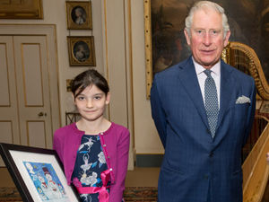 Supporting image for story: WATCH: Dudley schoolgirl meets Prince Charles after festive stamp success