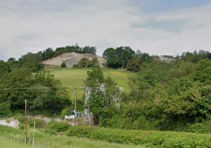 The quarry at Penstrowed from the A489 main road. Photo: Google.