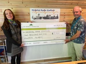 Claire Pagel ( Barratt Homes Sales Adviser) with Colin Smith at Hospital Radio Stafford