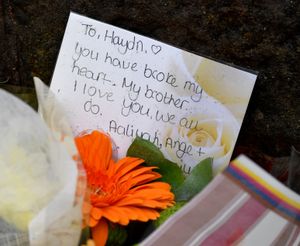 DUDLEY COPYRIGHT NATIONAL WORLD TIM THURSFIELD -07/08/25Tributes at the scene of the tragic car accident, which killed three people on the junction of Clarence Street and Highgate Street, Upper Gornal.