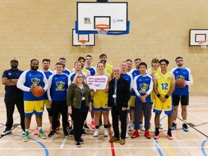 Supporting image for story: Basketball team raises funds to help older people