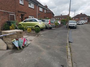 Residents of the area have left flowers to remember the 'loving neighbour'