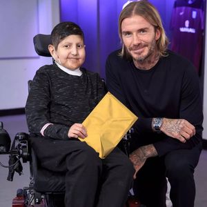 Moin pictured with David Beckham in 2017 when he was hailed with a Pride of Britain award