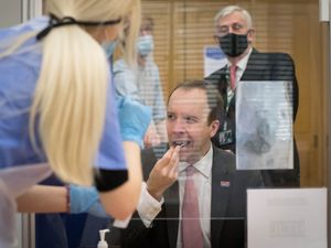 Supporting image for story: Public health officials investigate strains in UK showing E484K mutation