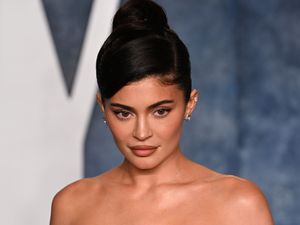 Supporting image for story: Kylie Jenner and daughter, five, wear matching outfits at Paris fashion show