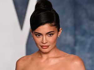 Supporting image for story: Kylie Jenner and daughter, five, wear matching outfits at Paris fashion show