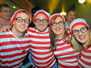 Supporting image for story: Darts fans hit the bullseye with costume capers at Wolverhampton Civic Hall