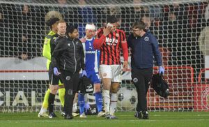 Walsall defender Priestley Farquharson was forced off with an eye injury.