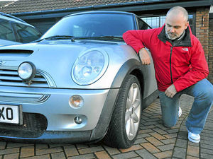 Supporting image for story: Motorist shocked as hole appears in road
