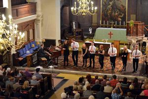 Tom performs alongside his friends at St Johns in the Square Church.