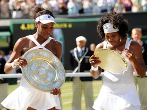 Supporting image for story: On this day in 2008: Venus Williams beats sister Serena to win Wimbledon title