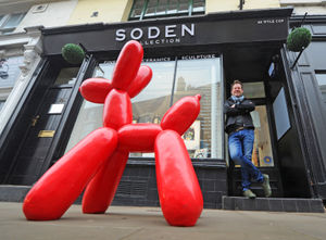 Jonathan Soden, owner of The Soden Collection art gallery in, Shrewsbury, with 'Jeff', a sculpture inspired by artist Jeff Koons