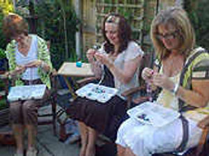 Supporting image for story: Strings of women love bead parties