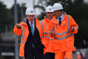 The PM donned a hard hat and hi-viz jacket during a visit to Manchester